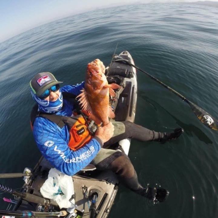 Rob Knowles with a Pacific Rockfish on a Wilderness Systems Thresher